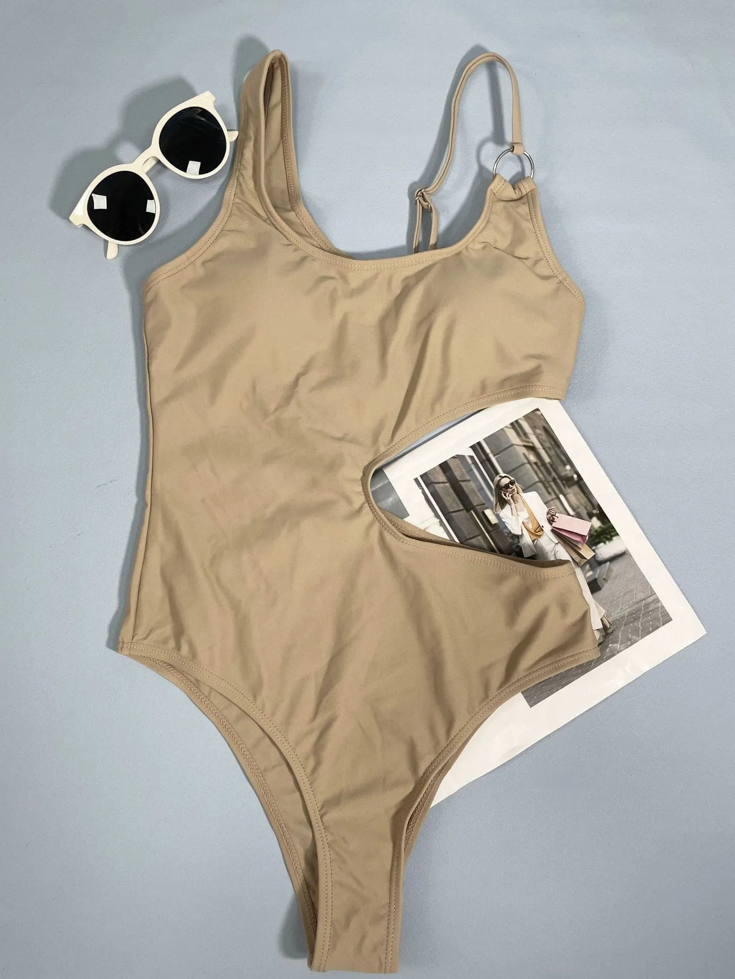 Hollow out irregular solid o ring one piece swimwear