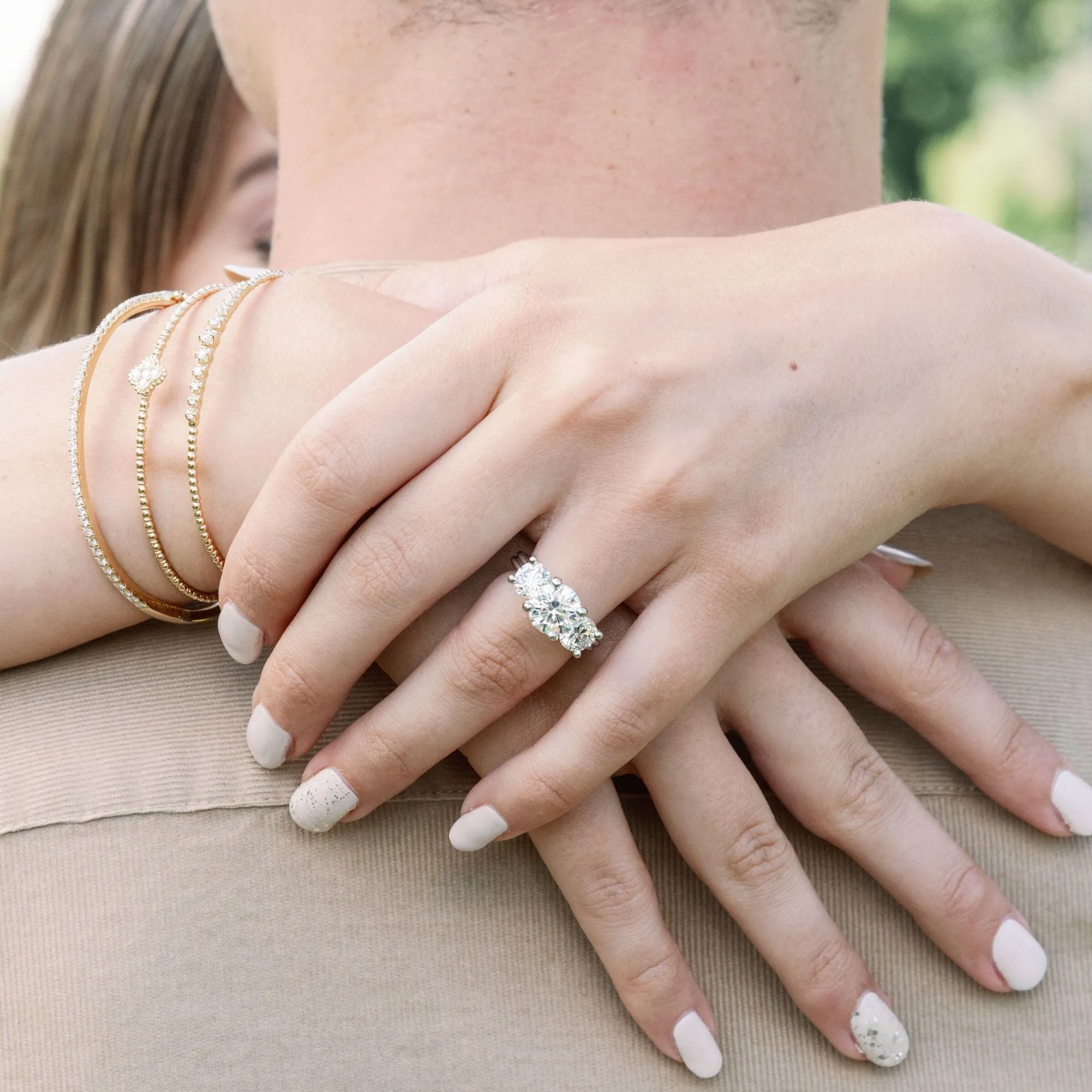 JON ANDERSON ROUND DIAMOND THREE STONE ENGAGEMENT RING