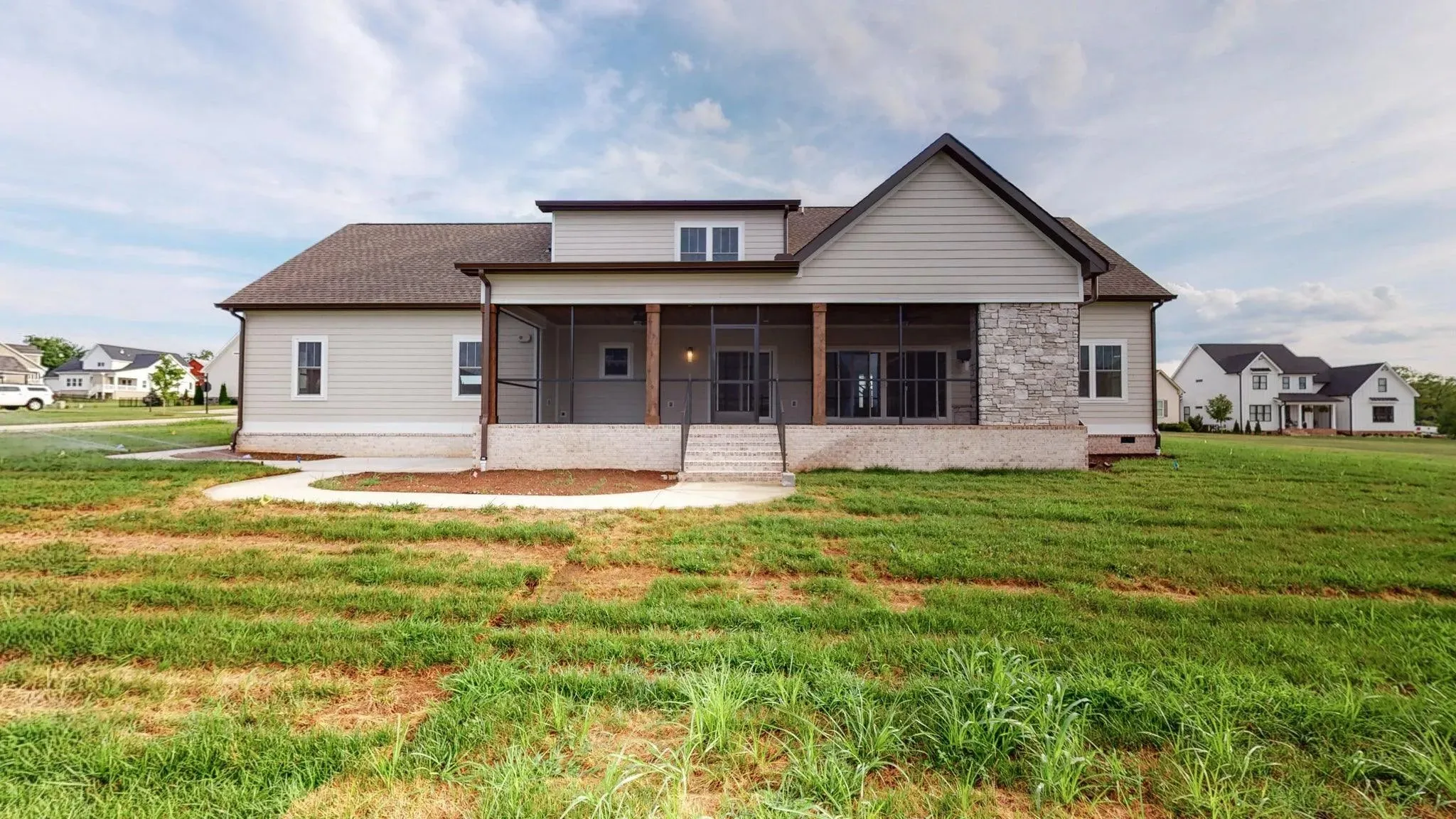 Versatile Family Home Plan with Stone Exterior and Spacious Layout