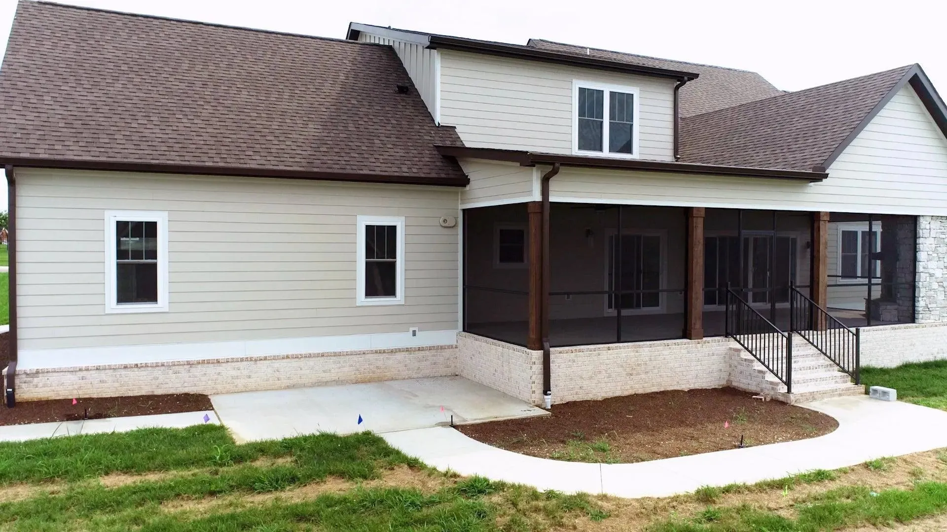 Versatile Family Home Plan with Stone Exterior and Spacious Layout
