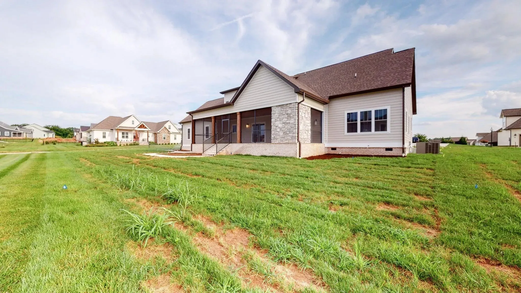 Versatile Family Home Plan with Stone Exterior and Spacious Layout